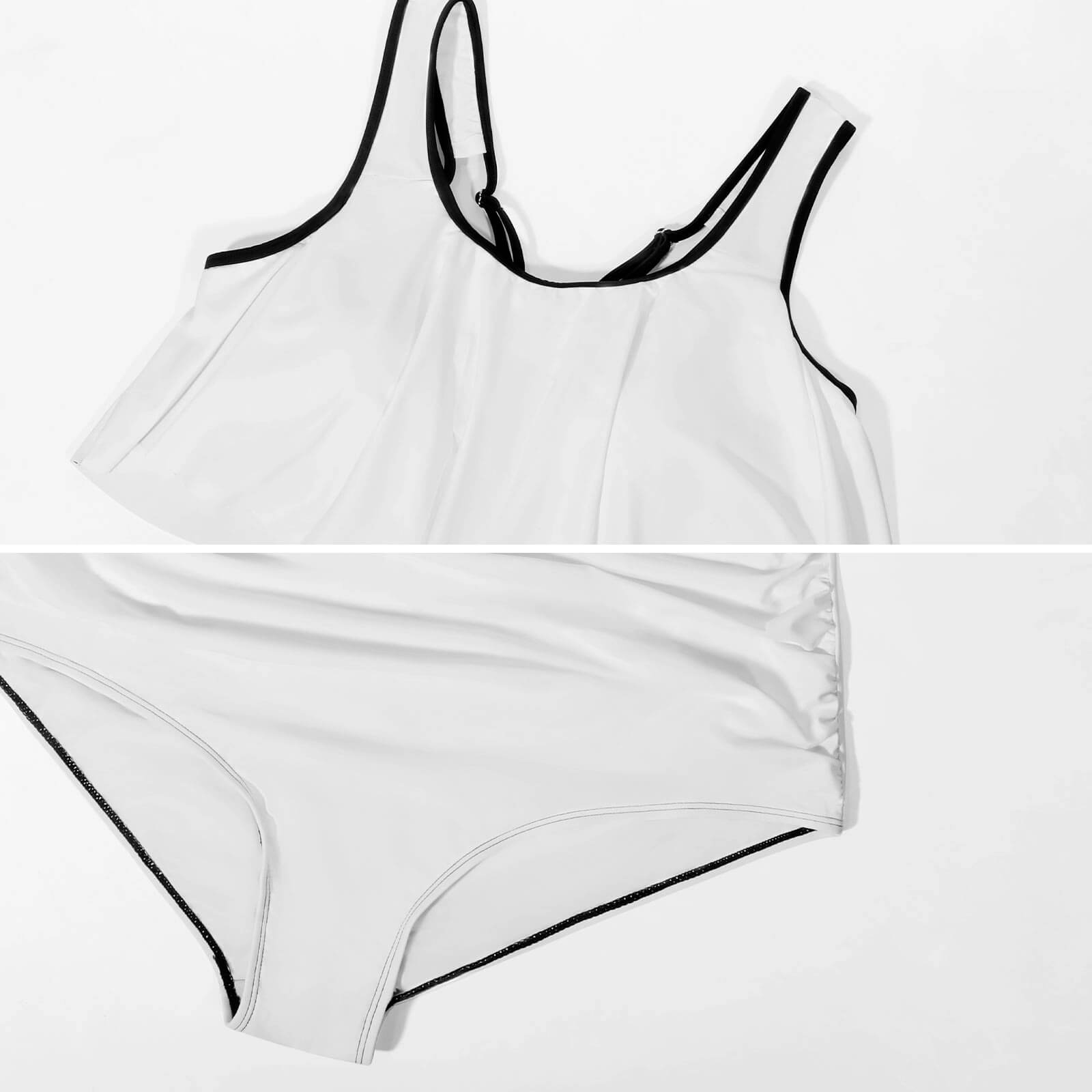 White bikini swimsuit with black trim, high-waisted bottom and ruffle top, perfect for summer.