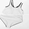 White bikini swimsuit with black trim, high-waisted bottom and ruffle top, perfect for summer.