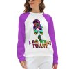 Raglan sweater with "I DO WHAT I WANT" print, purple sleeves, comfortable fit.