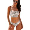 Stylish two-piece bikini swimwear, featuring a light color background with some flowers on it and high-waisted design.