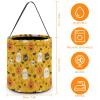 Halloween candy tote bag with ghost and pumpkin pattern, yellow background, reusable polyester.