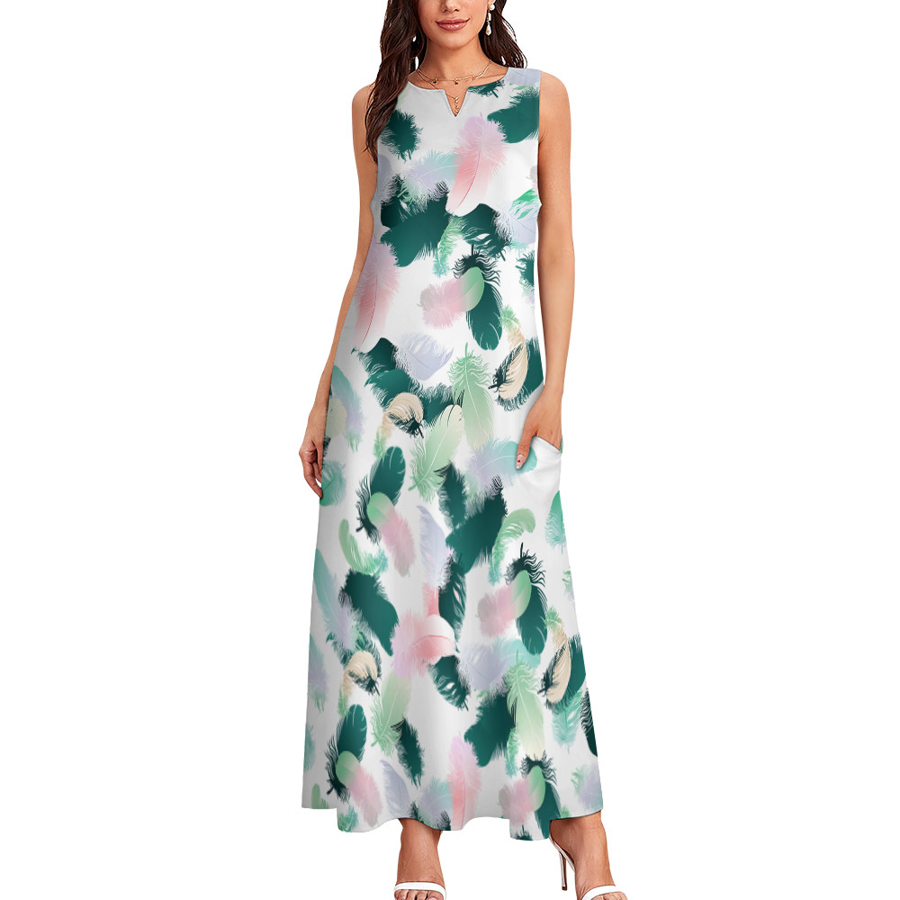 White sleeveless long dress with green and pink floral print, perfect for summer