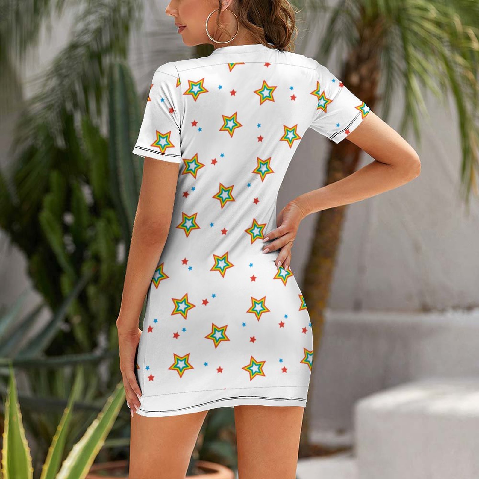 White crew neck short sleeve dress with star print, perfect for casual wear.