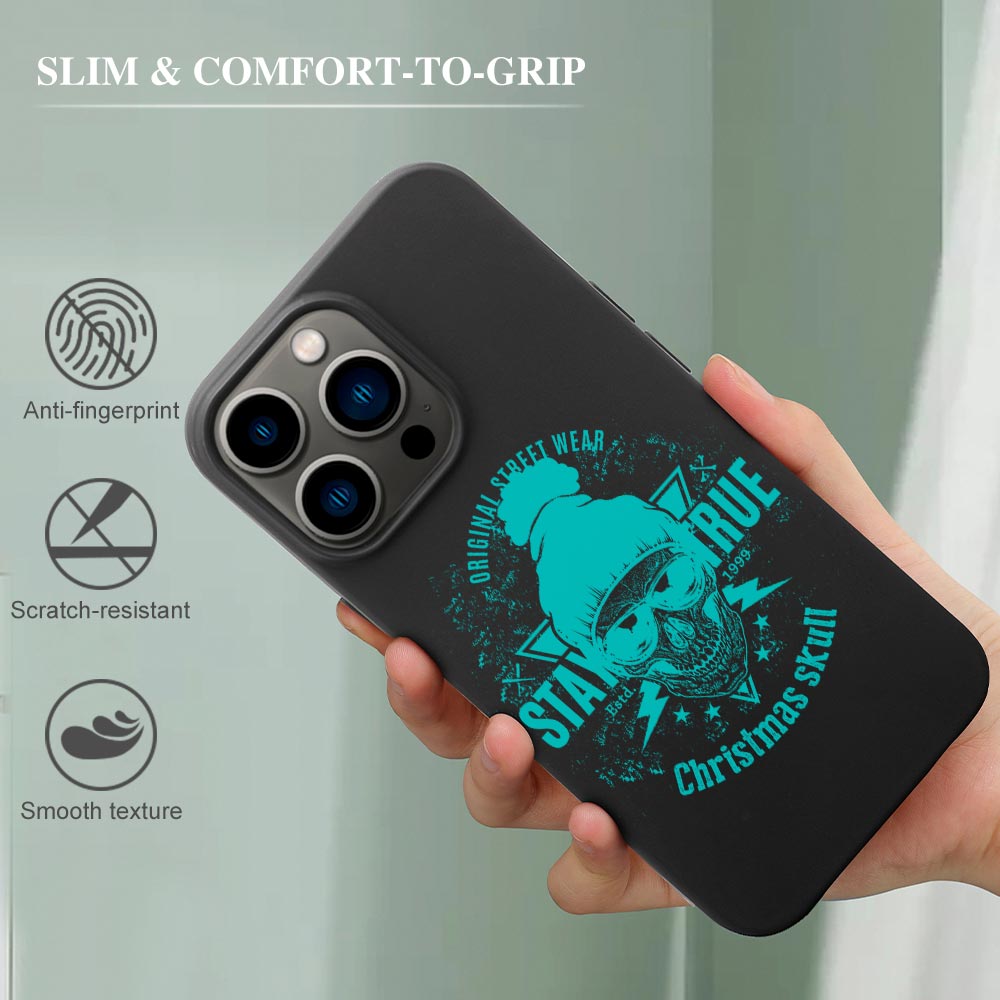 iPhone 13 case with 'Stay True Christmas Dude' design, black TPU, glow-in-the-dark, wireless charging compatible.