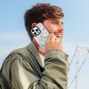 Man on call using iPhone 16 with cartoon design case