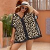 Leopard print beach swim cover-up with V-neck and lace trim, perfect for swimwear.