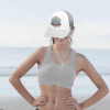 Woman wearing a white and gray baseball cap with a graphic design, mesh back, perfect for outdoor activities, Inkedjoy