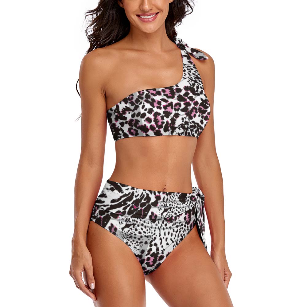 Floral one-shoulder bikini swimsuit. High-waisted design. Black and white print. Perfect for the beach.