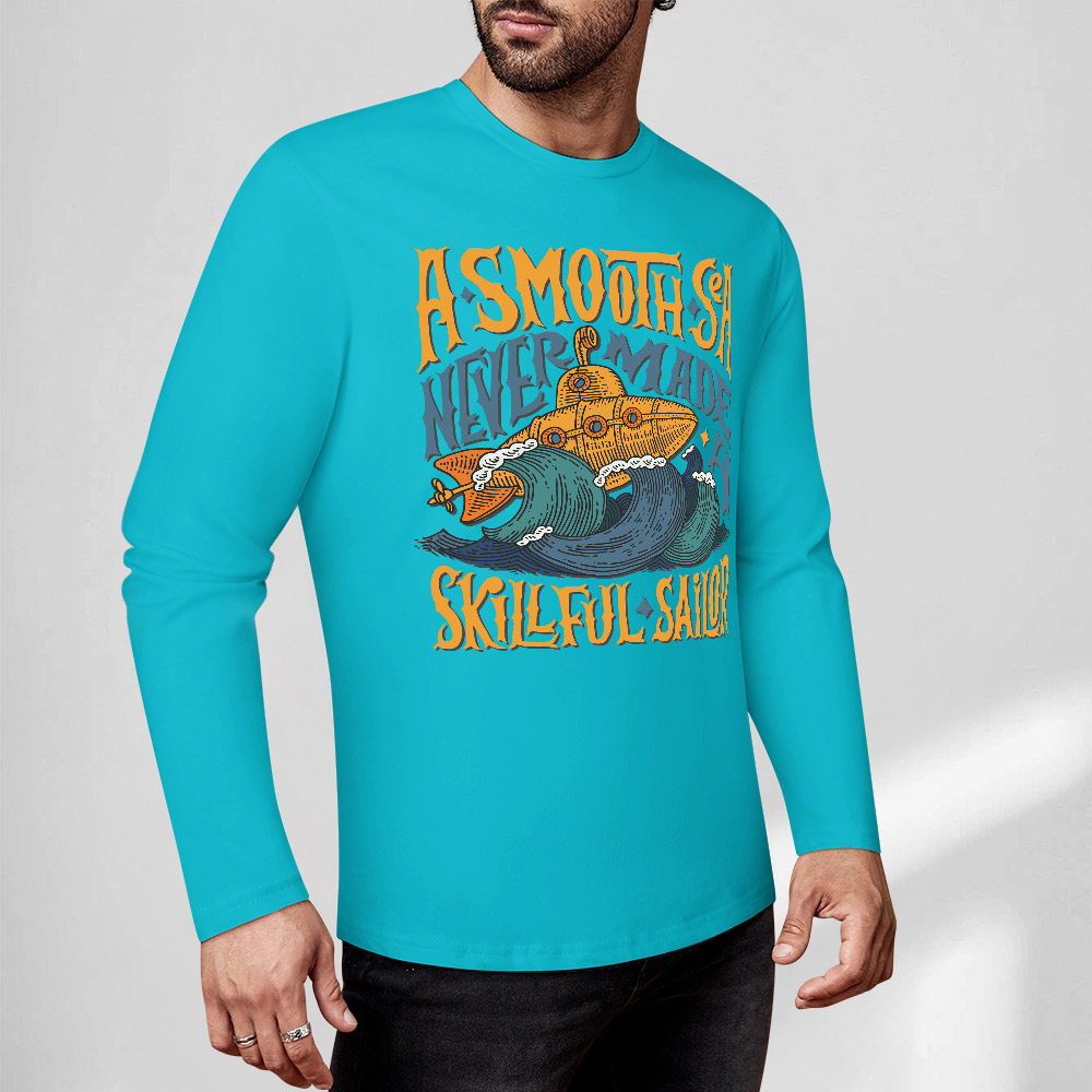 Turquoise long sleeve T-shirt featuring ASMODUS Shark Attack graphic, pure cotton, casual wear.