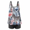 Busty model plus size split swimsuit set with tropical print, perfect for pool.