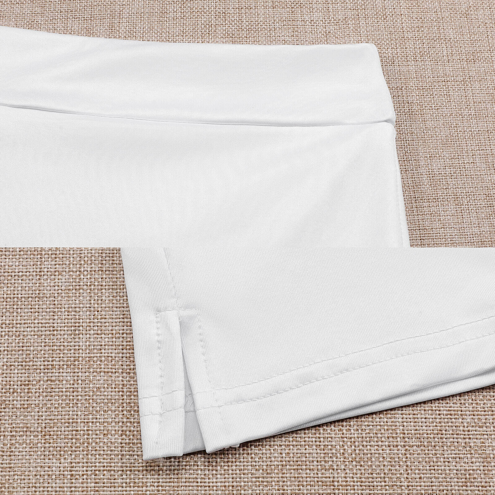 White light proof trouser skirt with pocket, showcasing the material texture and design details.