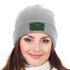 Gray knitted cap with custom logo on a woman, perfect for winter warmth and branded style.