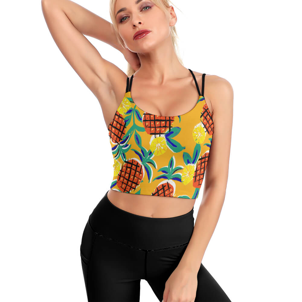 Yellow pineapple print yoga top for women, perfect for yoga or any workout. Available in various sizes.