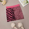 Pink zebra and leopard print light proof trouser skirt with pockets.