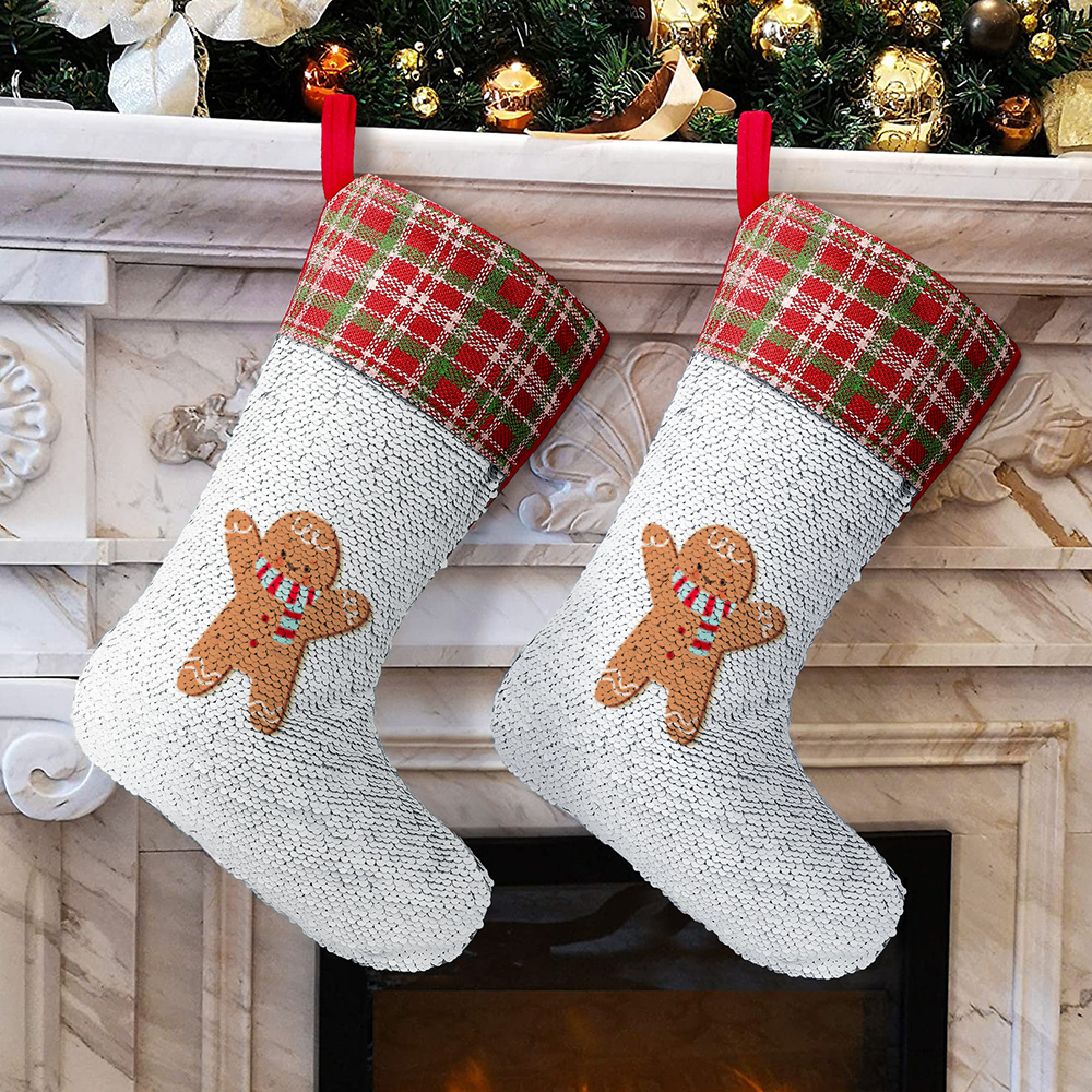 Christmas stockings with gingerbread man on fireplace, holiday decor