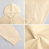 Cream cotton hooded sweater details: hood, sleeve, pocket and fabric texture. Breathable and comfortable.