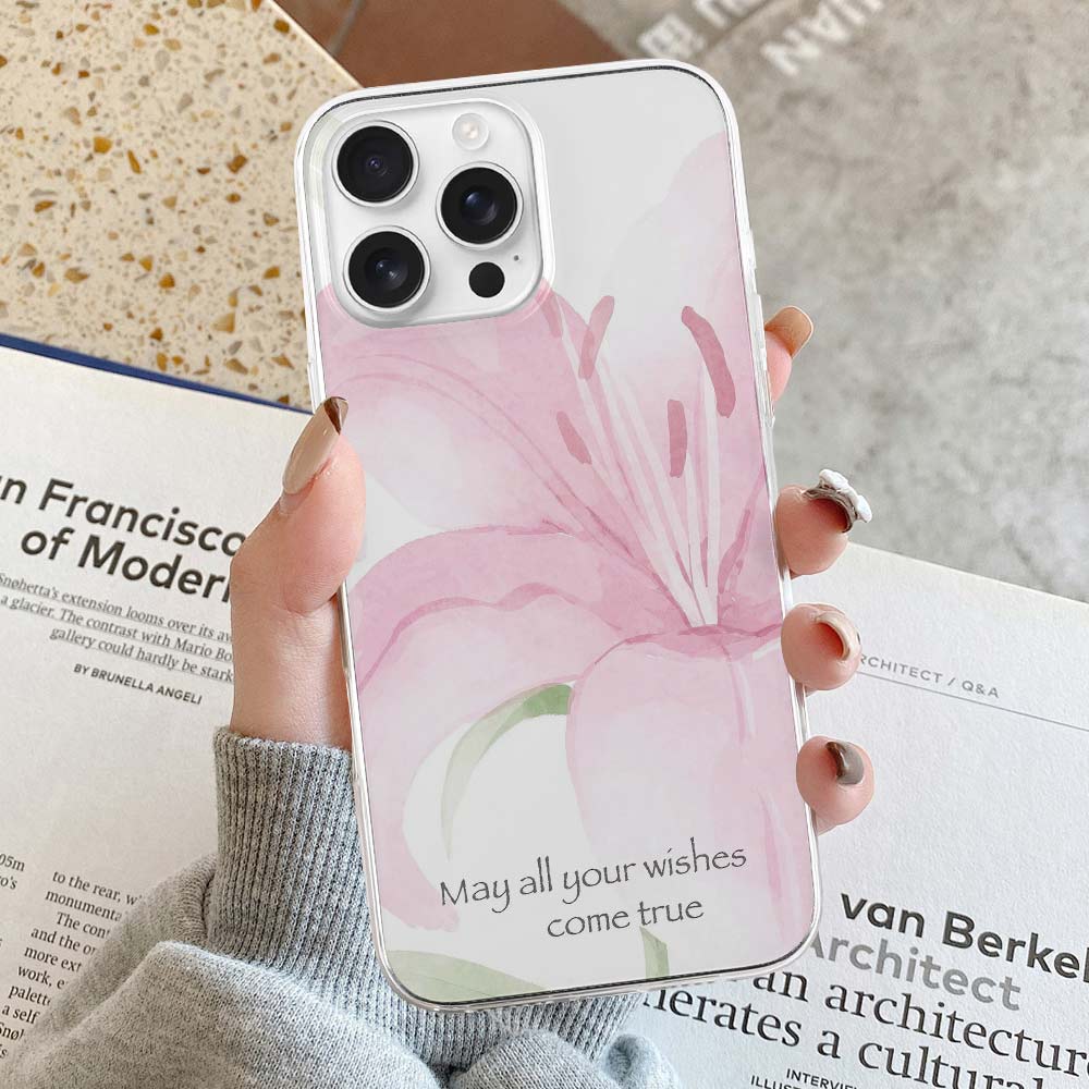 iPhone 16 series case with pink watercolor floral design, "May all your wishes come true" text, TPU protective cover.
