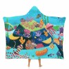 Hooded blanket featuring a vibrant underwater scene with coral, fish, and jellyfish, perfect for cozy lounging.