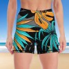 Women's slim two-piece yoga shorts set featuring a tropical floral print in black, perfect for yoga and fitness.