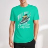 Green cotton short-sleeved T-shirt with a surfer and 'Wild Wave California' print, summer fashion.