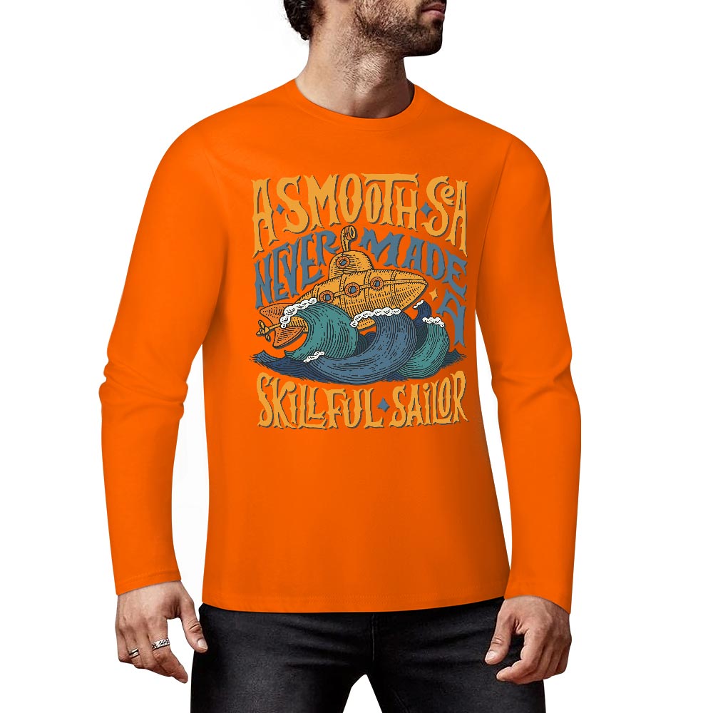 Orange pure cotton long sleeve T-shirt with graphic design, featuring ASMODUS Shark Attack text, casual wear.