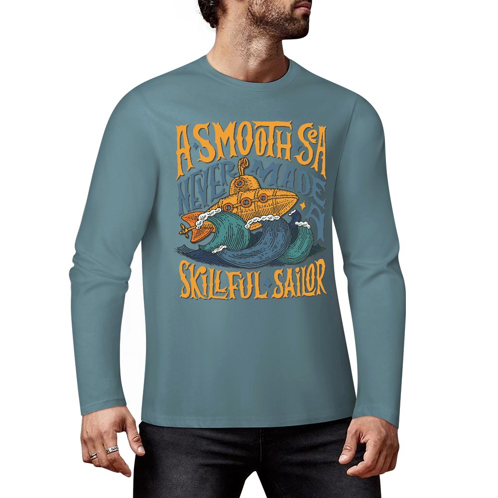 Turquoise pure cotton long-sleeved T-shirt with 'ASMODUS Shark Attack' graphic for casual wear.