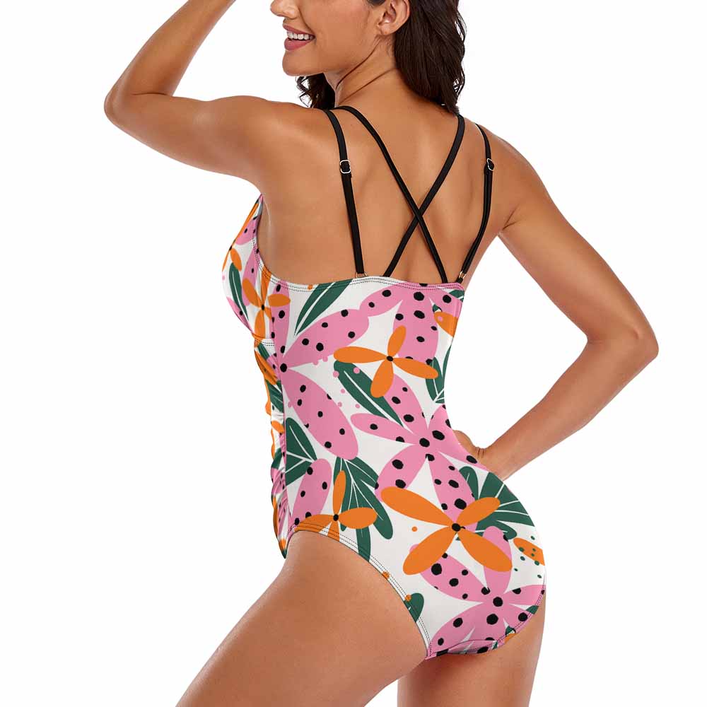 Floral one-piece swimsuit with double shoulder straps, perfect for summer beach wear.