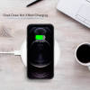 iPhone 12 series phone charging wirelessly on a white pad, TPU case compatible, stylish design
