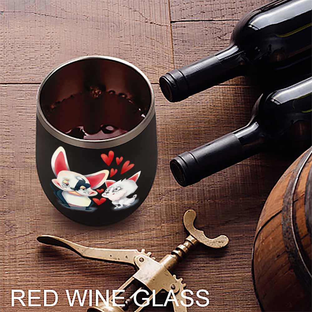 Black stainless steel insulated cup with cartoon cat and penguin design, filled with red wine, Inkedjoy