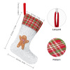 Christmas stocking with gingerbread man and pattern detail, perfect for holiday gifts and decor