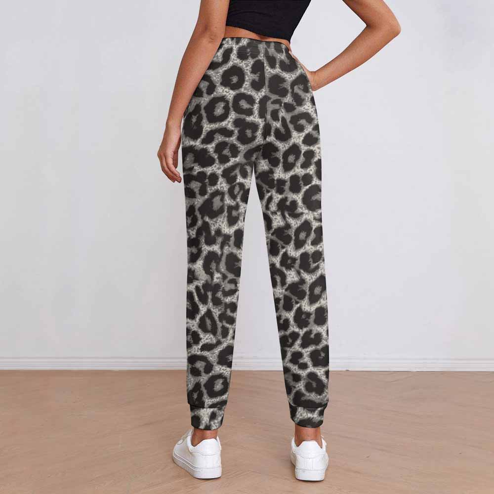Women's leopard print sweatpants, featuring elastic waistband and drawstring, perfect for casual wear, made of polyester.
