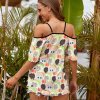 Off-shoulder sling top with a fun, colorful print, perfect for casual wear in summer