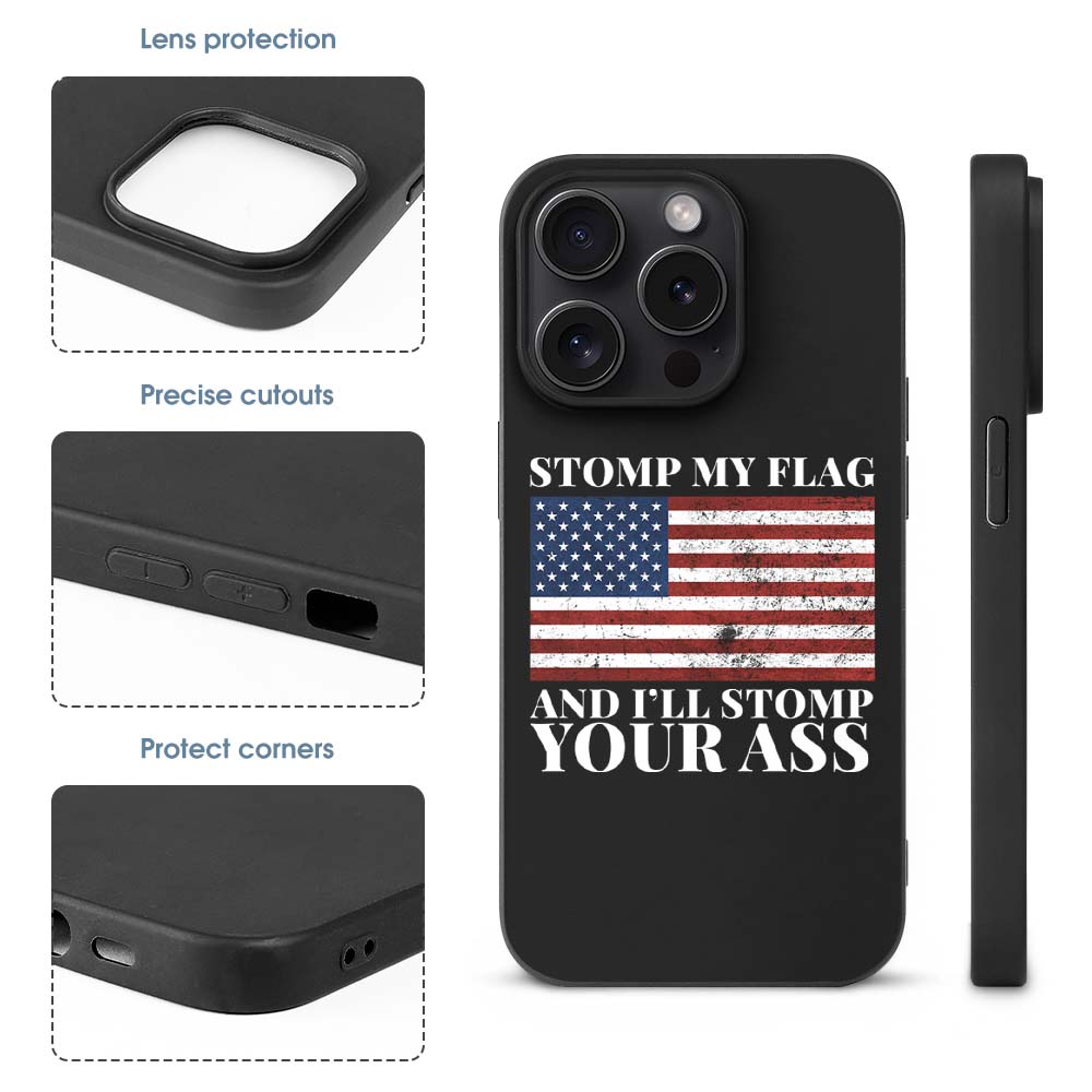 iPhone 15 Pro case with American flag design, black TPU, text "STOMP MY FLAG AND I'LL STOMP YOUR ASS", shockproof.