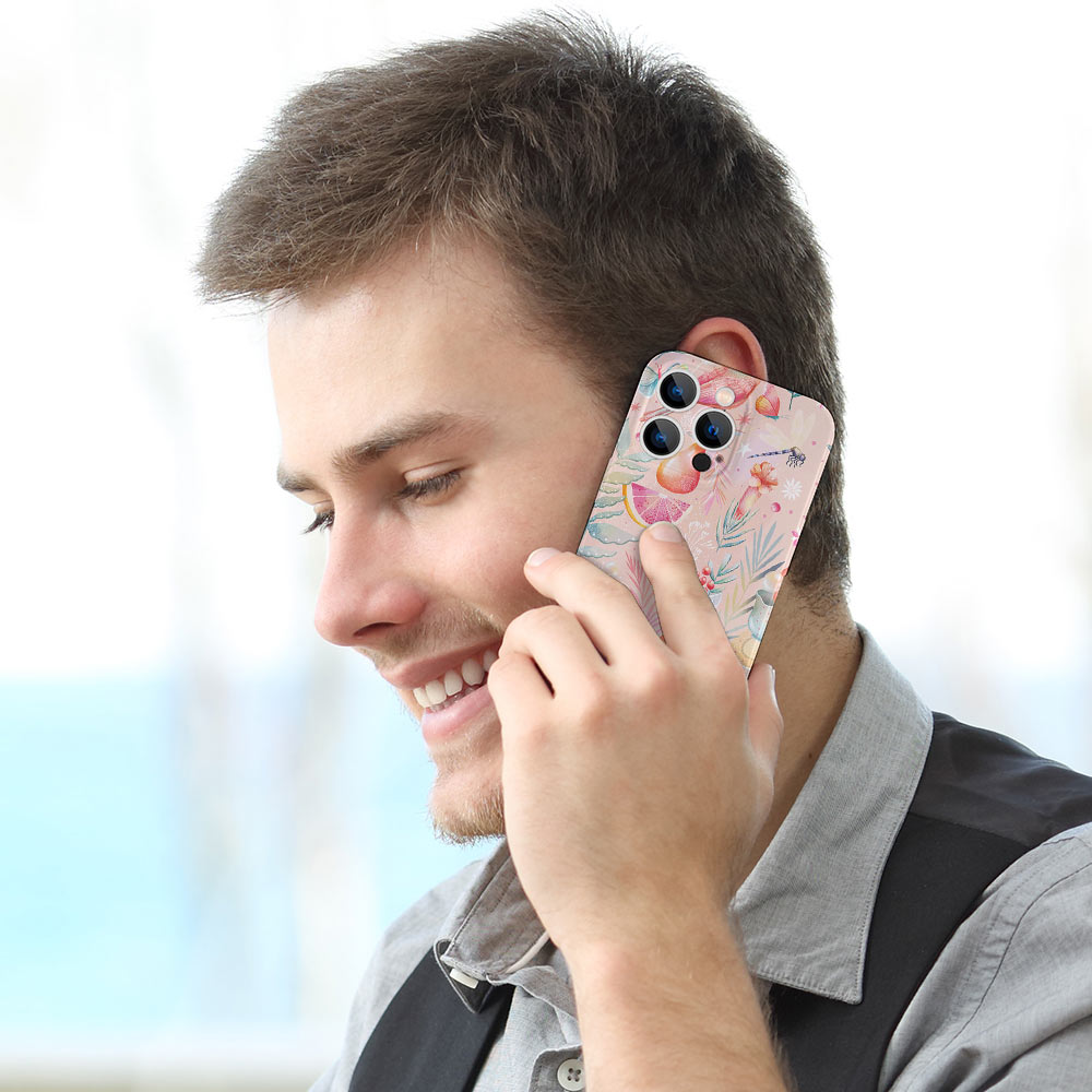 Man on phone, showing floral iPhone 14 case, PC plastic, scratch-resistant, precise cutouts