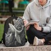 17-inch backpack with whale design, durable 600D polyester, suitable for campus and travel.