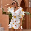 White V-neck short sleeve dress with floral pattern, perfect for vacation