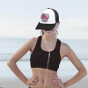 Woman wearing a baseball cap with a floral graphic design, mesh back for outdoor activities, Inkedjoy
