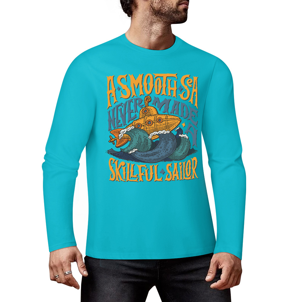 Turquoise pure cotton long sleeve T-shirt featuring ASMODUS Shark Attack graphic for casual wear.