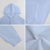 Light blue cotton hooded sweater fabric detail, soft texture and comfortable design.