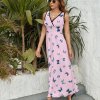 Pink sleeveless maxi dress with butterfly print, perfect for parties and everyday wear.