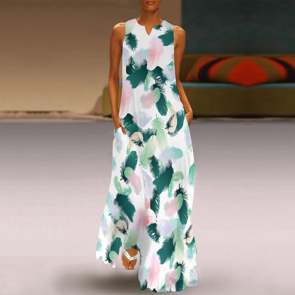 Sleeveless long dress in white with green and pink floral print, made of polyester, perfect for summer vacation