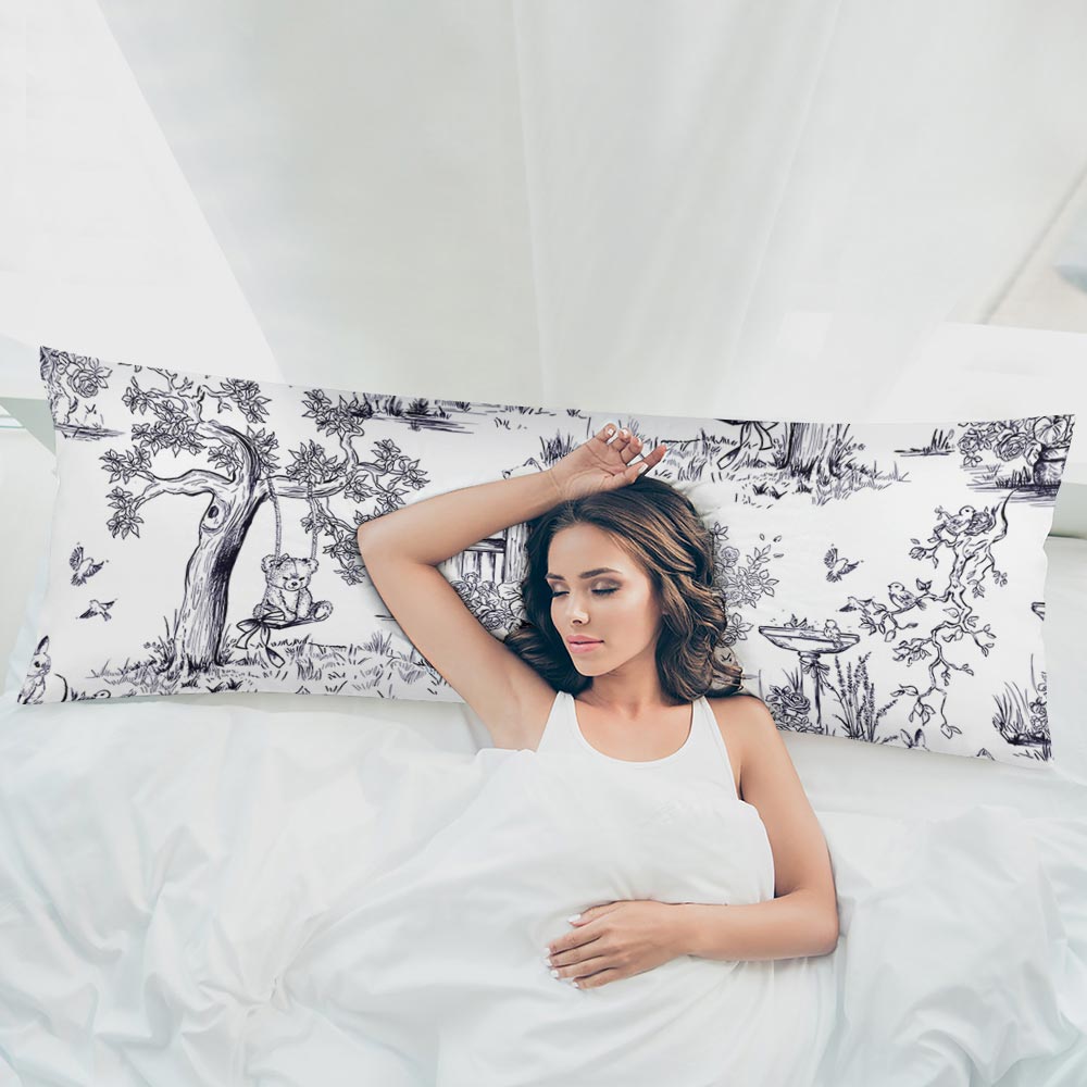 Woman resting on extra long pillow case, featuring unique printing design