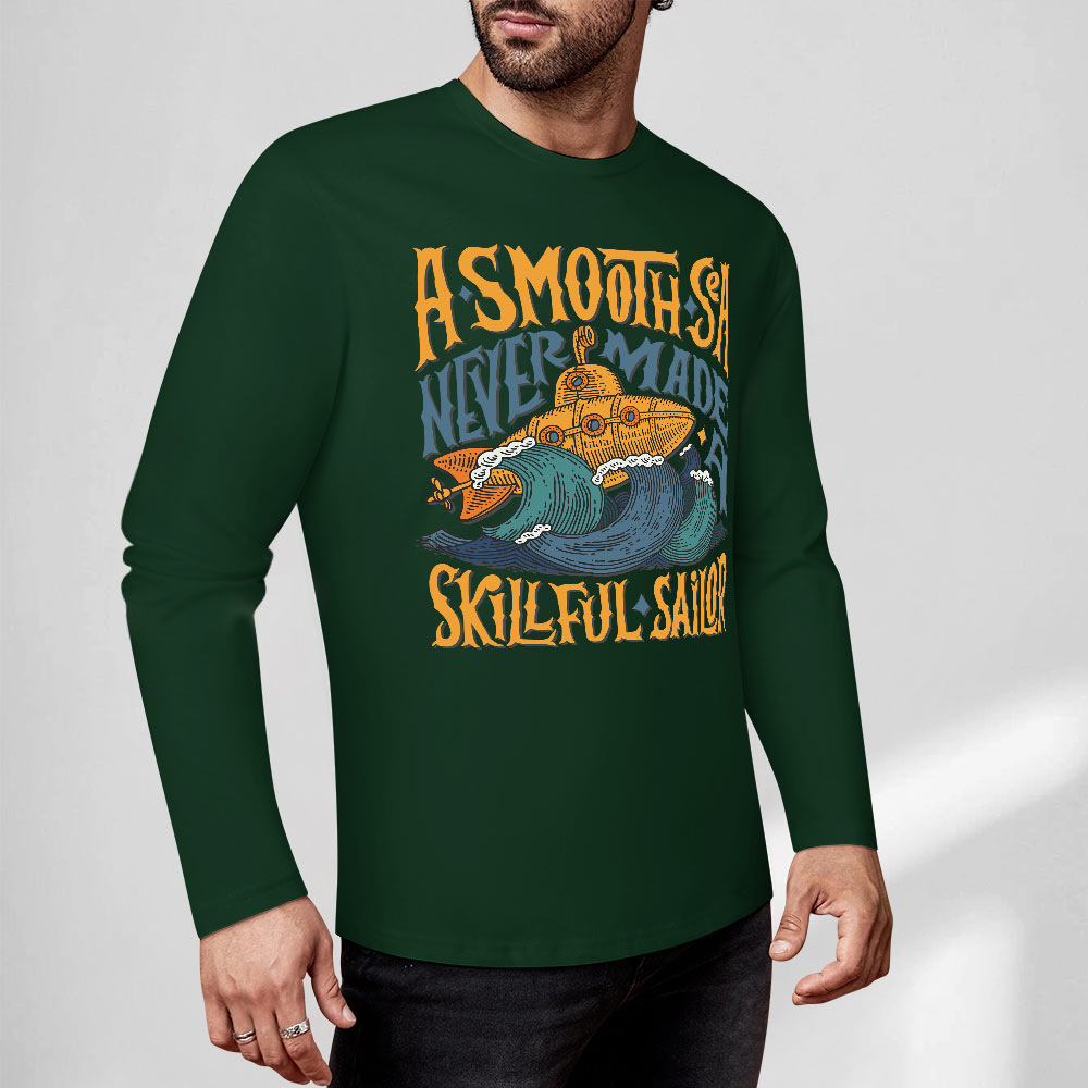 Green pure cotton long sleeve T-shirt featuring ASMODUS Shark Attack graphic for casual wear.