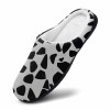 Cotton slippers with rubber sole. Features a comfortable design, black and white pattern, ideal for indoor wear.