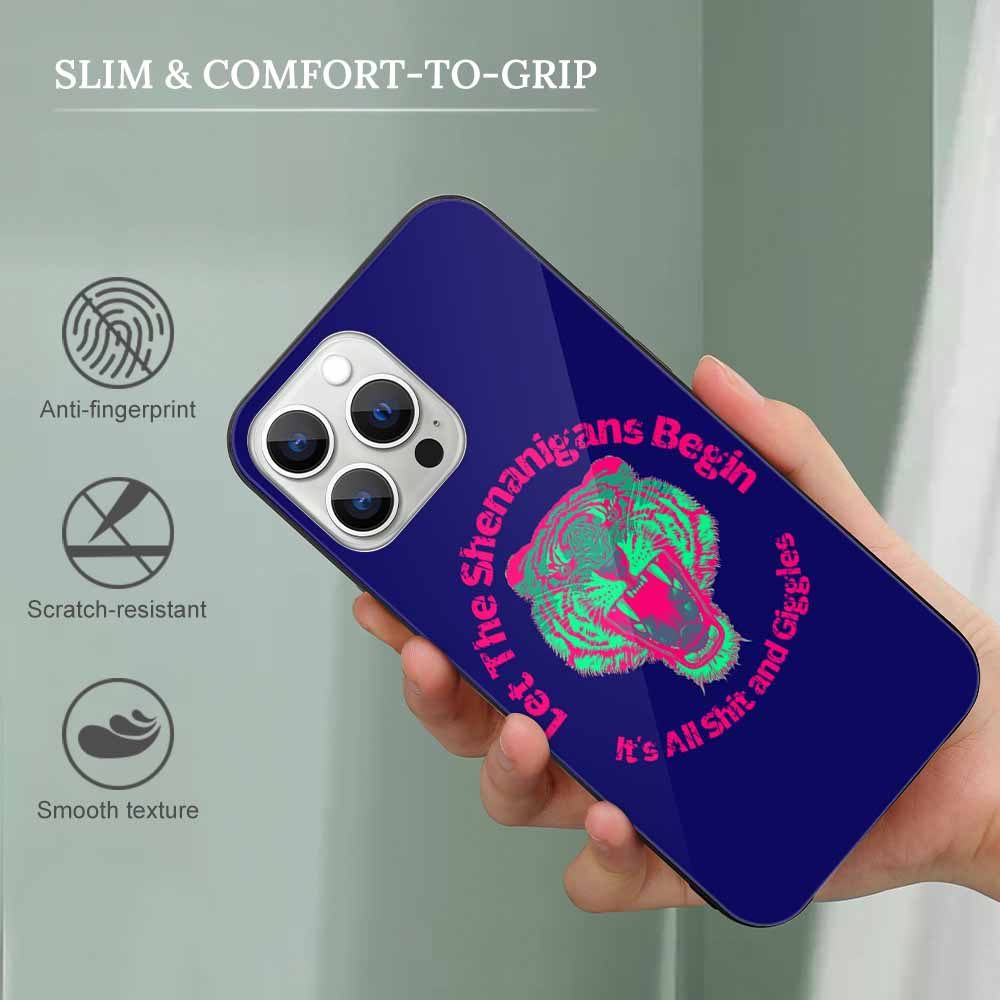 iPhone 13 case with tiger face design, glass back, scratch-resistant, and wireless charging compatible.