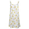 White beach sling dress with yellow floral print, suitable for party and vacation wear.