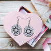 Round wooden earrings with crystal embellishments, presented in a heart-shaped gift box, perfect for gifting.