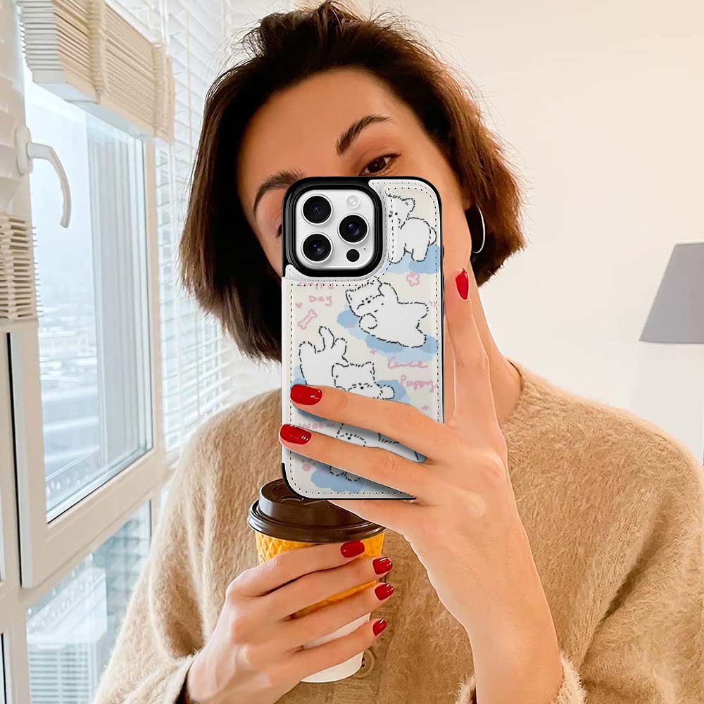 Woman holding iPhone 16 case with cartoon design, card slot, and coffee cup.