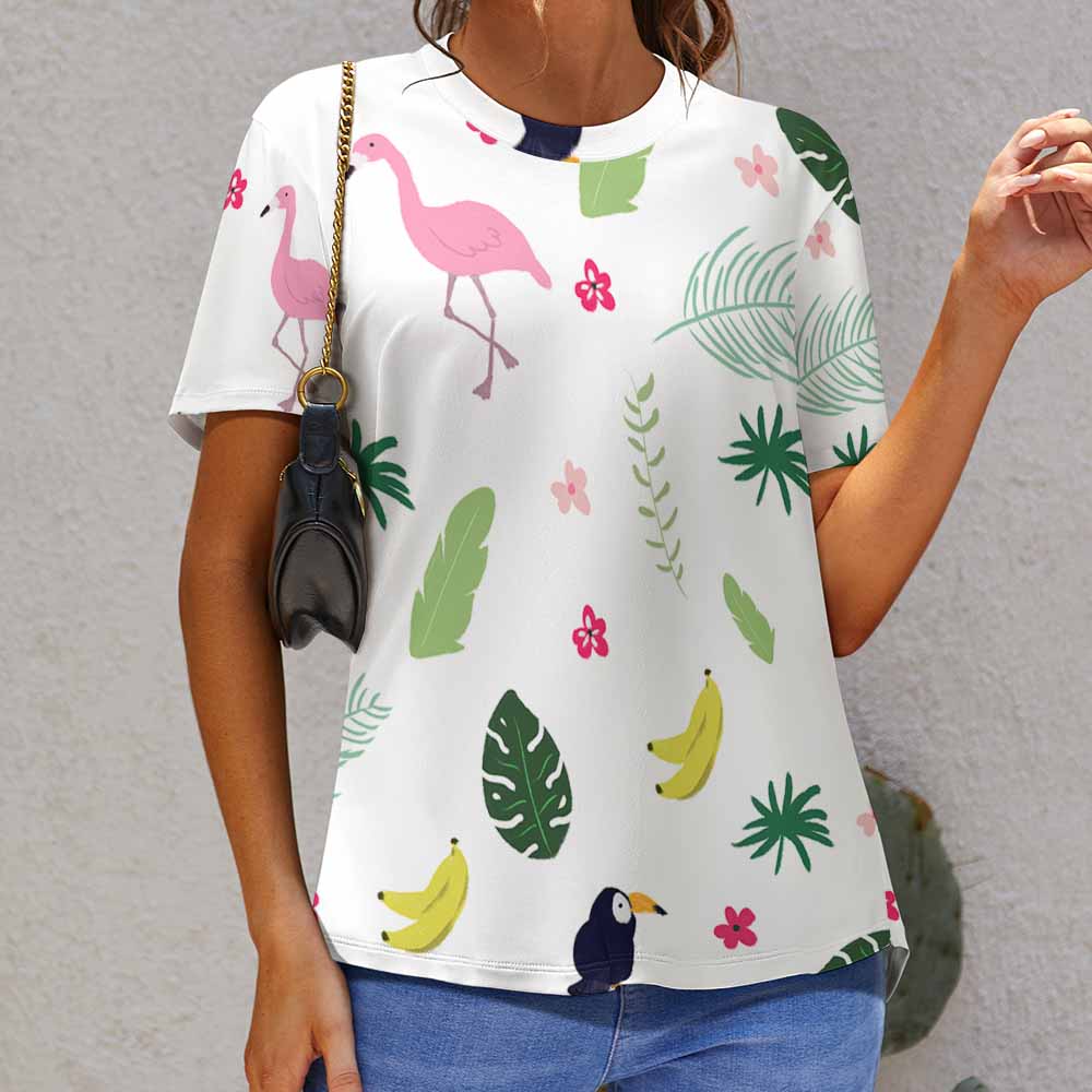 White women's t-shirt with flamingo, tropical leaves, and banana pattern print. Breathable fabric.