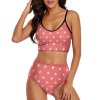 Pink polka dot bikini swimwear, high waisted design for a flattering fit.
